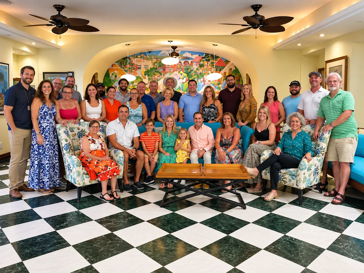 A large group of retreat guests and families gathered in a resort lounge